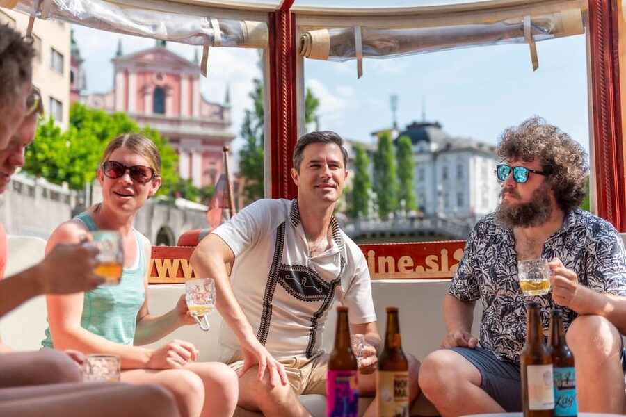 BEER WAY Ljubljana: Boat & Craft Beer Tasting Tour - Seeing Prešeren Square, the Triple Bridge, and the pink church from the water