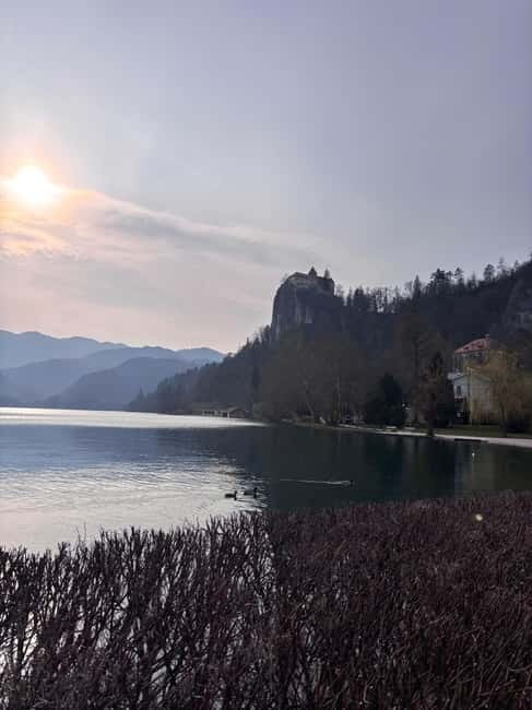Bled: Lake Bled Guided Walking Tour with Cream Cake - Meeting at Občina Bled, blue umbrella in hand