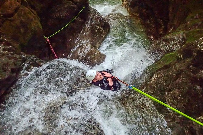 Canyoning Bled Slovenia - The canyon session: climbing, rappelling, slides, and river time