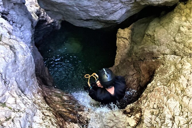 Dynamic Adventure Canyoning in Bovec with Free Photos and Videos - The 12-Meter Waterfall Rappel: The Big Moment