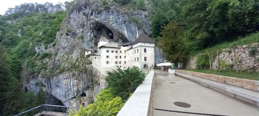 From Ljubljana: Postojna Cave & Predjama Castle Guided Trip - From Trg francoske revolucije to the cave, in a small Mercedes van