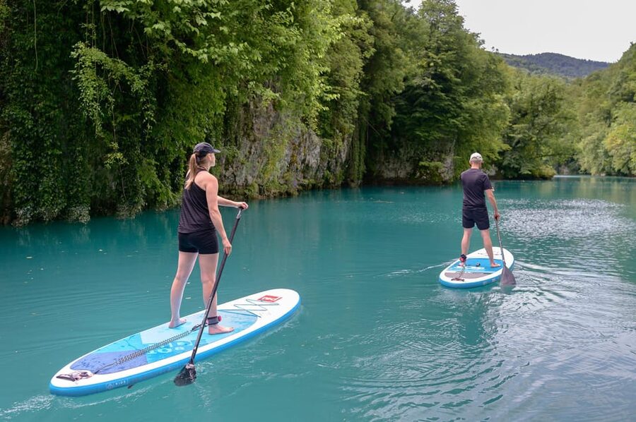 Half Day Stand-up Paddle Boarding on the Soča River - Idrijščica canyon paddling with 15-meter walls overhead