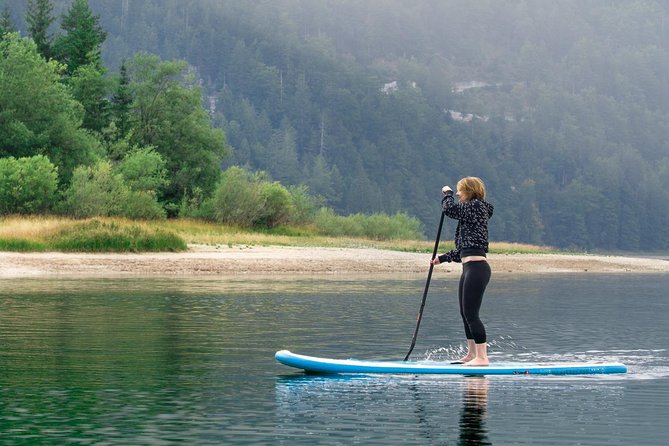Half Day Stand-up Paddle Boarding (SUP) trip on Lake Predil - The mid-route beach break, snacks, and photo moments