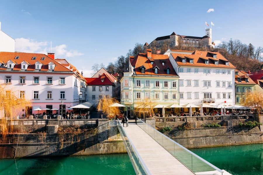 Ljubljana: 2h walking tour with local guide - Prešeren Square, Triple Bridge, and castle views on foot