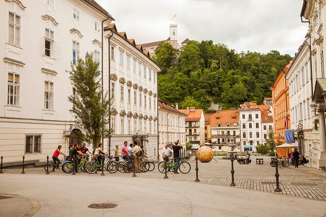 Ljubljana Cruiser Bike Tour - Triple Bridge and Dragon Bridge: the river view that organizes it all