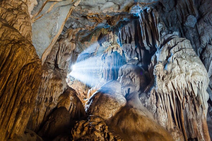 Ljubljana: Postojna Cave & Predjama Castle Tickets and Tour - Predjama Castle under the archway: what you do in about an hour
