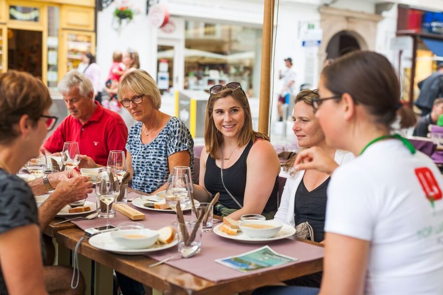 Ljubljana: Slovenian Cuisine Walking Tour with Tastings - What you’ll taste: five Slovenian wines, regional dishes, and oil