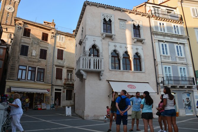 Piran Walking Tour with Local Wine and Food Tasting - First of May Square, the old water supply, and the end-food payoff