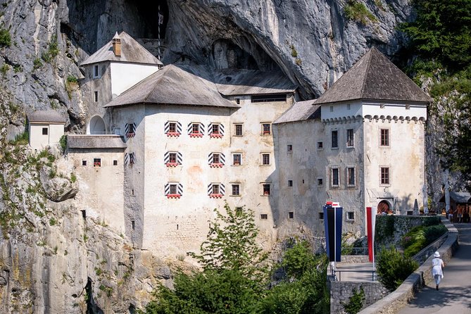 Postojna Cave & Photostop Predjama castle - Group Tour from Koper - Predjama Castle: what you get in a 15-minute photo stop